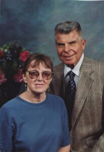 A couple poses for a portrait. 