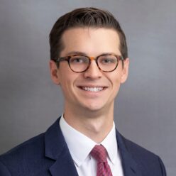 Smiling man in suit and tie